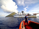 Research teams launch from the NOAA Ship Hi'ialakai to conduct coral reef surveys around the remote, unpopulated, volcanic island of Asuncion within the Marianas Trench Marine National Monument. Credit: NOAA, James Morioka